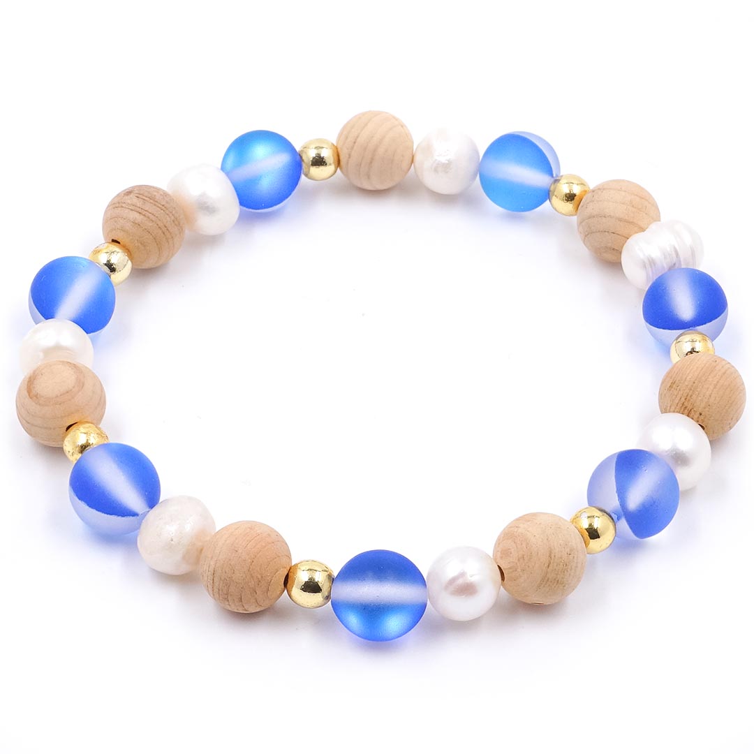 Delphine - Tenyésztett gyöngy és Palo Santo karkötő