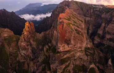 Mountain peaks in overcast evening